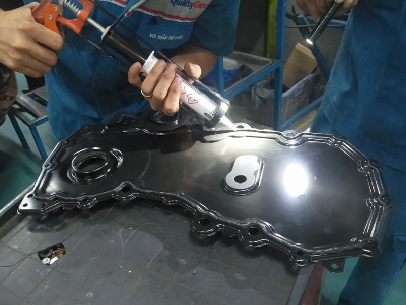 Ford Ranger lỗi chảy dầu: Nguyên nhân và cách khắc phục 1 Mặt bưởng cam động cơ (nắp che dây đai cam) rò dầu